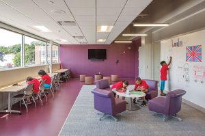 Photosensors in the row of fixtures nearest the window automatically dim classroom lights.